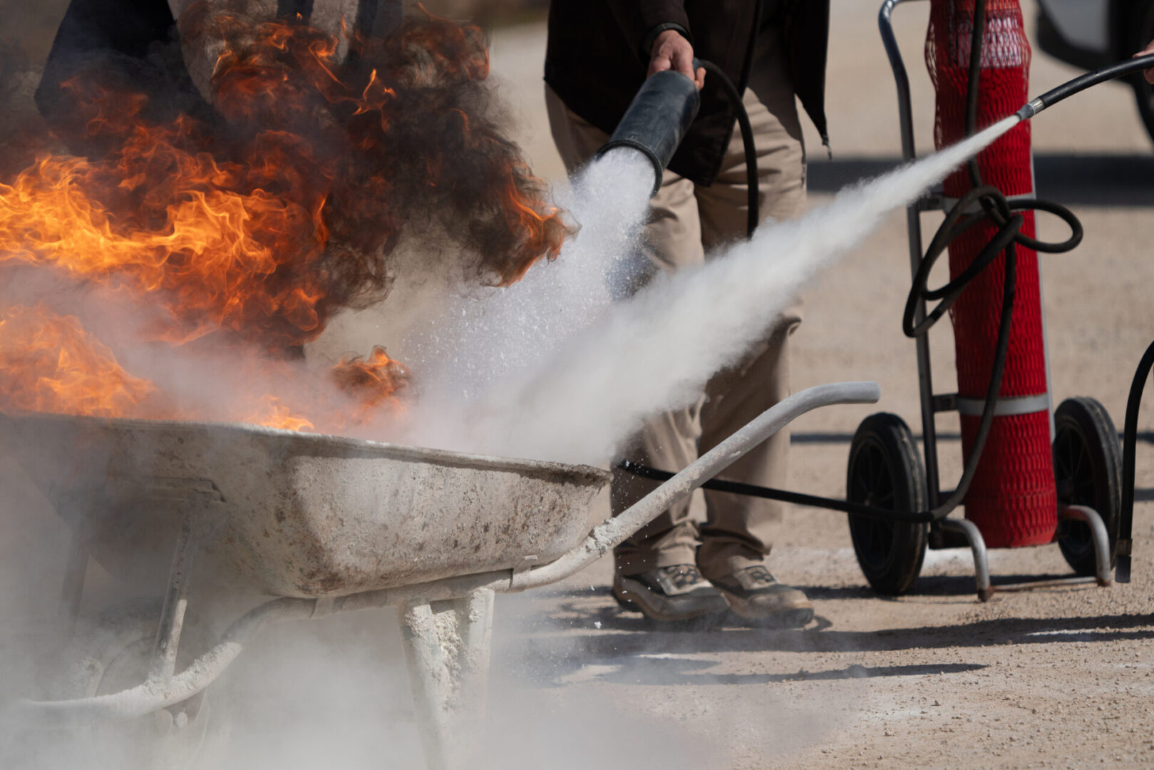 Fire extinguisher used on wheelbarrow fire.